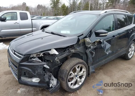 2014 Ford Escape Titanium z USA, uszkodzony, nr VIN 1FMCU9J93EUD97735